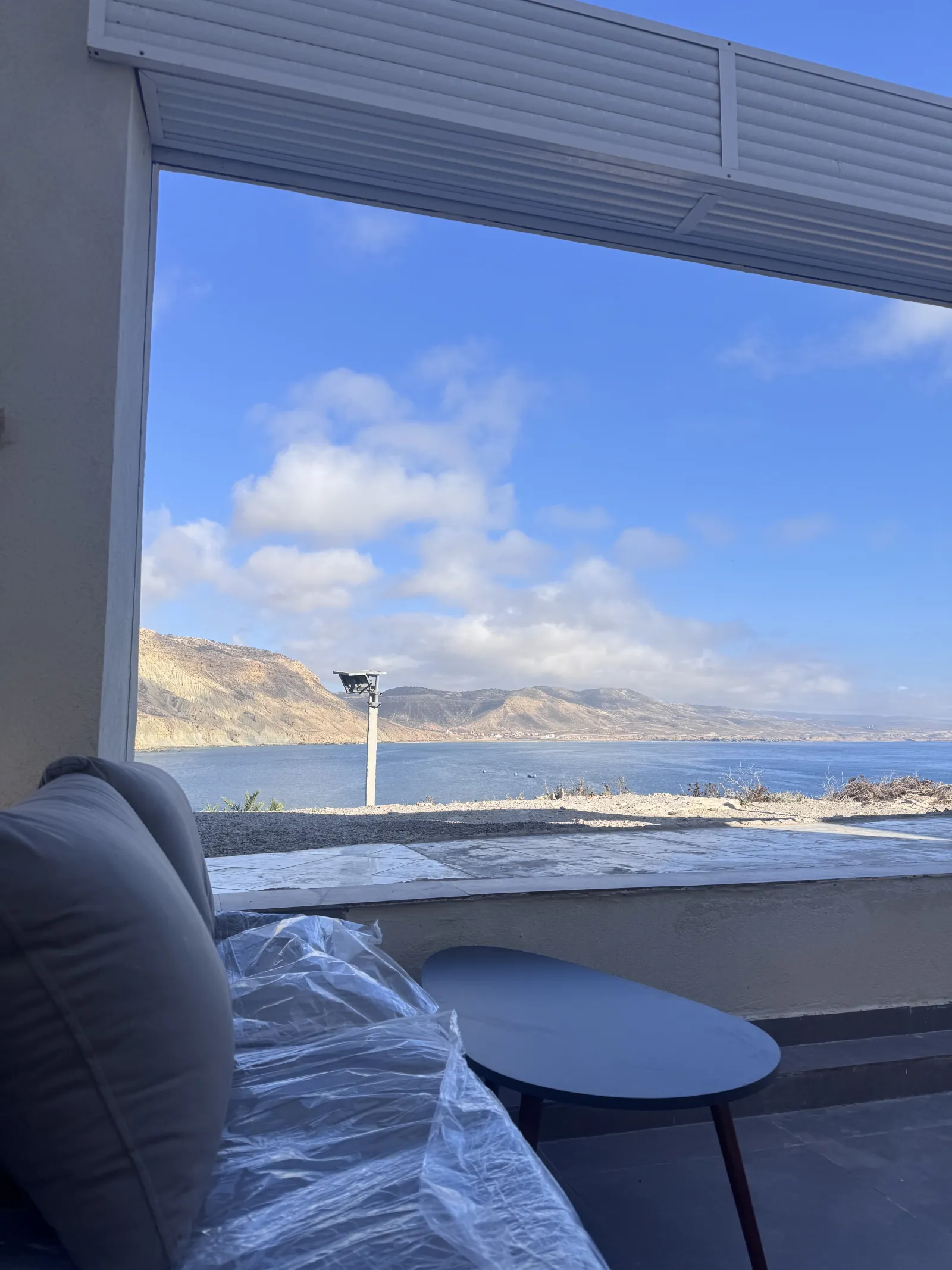 The terrace · framing the bay